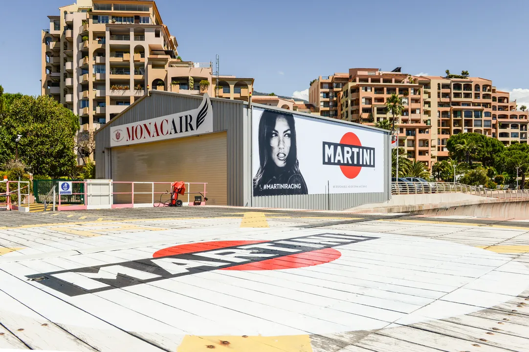BANNED POSTER GIRL WHO DISTRACTED LEWIS HAMILTON RETURNS TO MONACO