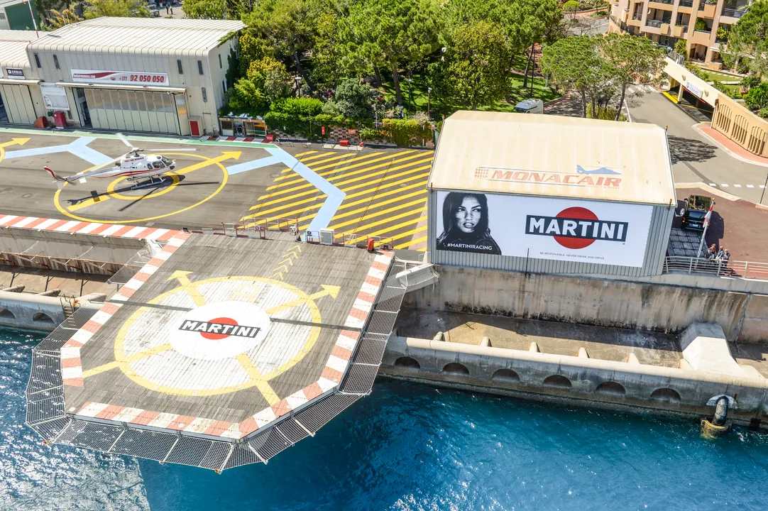 BANNED POSTER GIRL WHO DISTRACTED LEWIS HAMILTON RETURNS TO MONACO