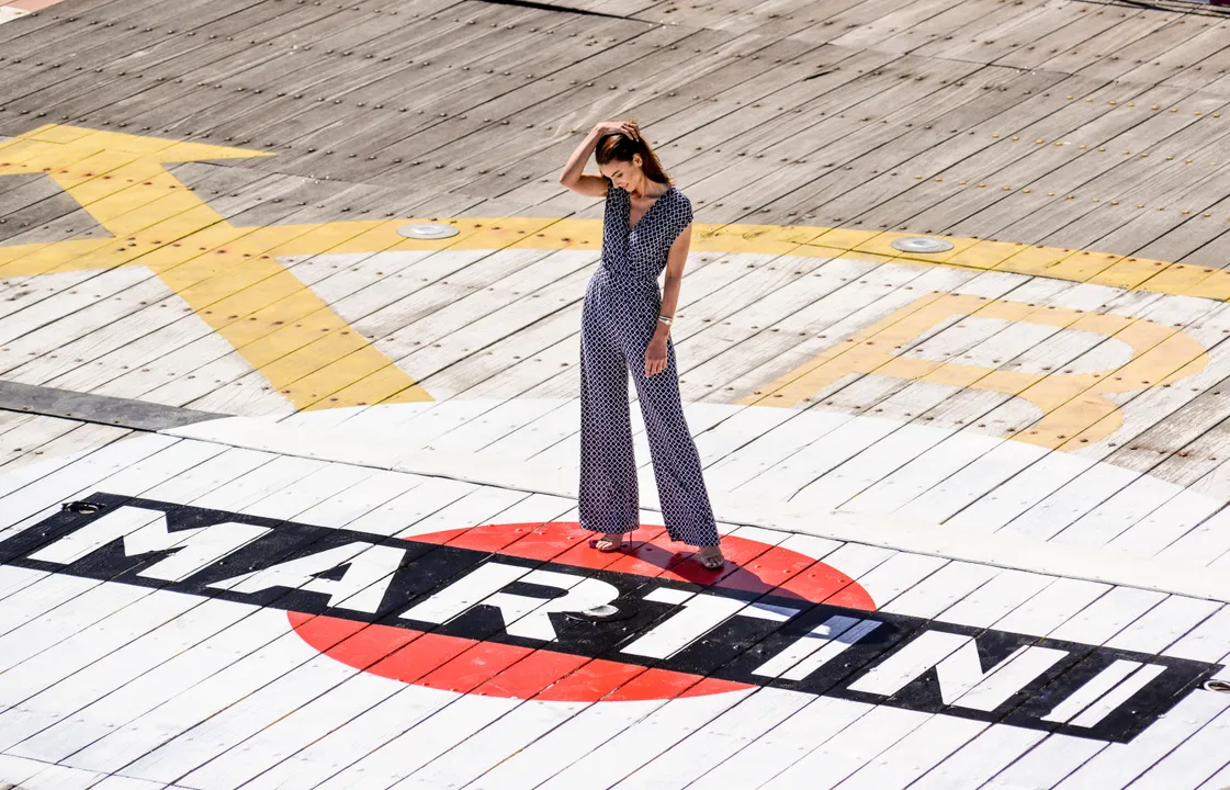 BANNED POSTER GIRL WHO DISTRACTED LEWIS HAMILTON RETURNS TO MONACO