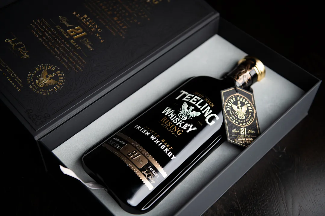 acfc55ce-e1f4-40f0-a303-f40b8105b7f9-Teeling Whiskey Rising Reserve 4 Pack Shot (Top down).jpg