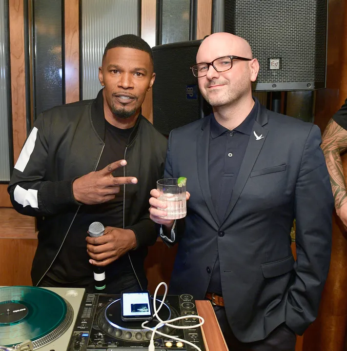 GREY GOOSE OFF SCRIPT MEDIA MIXER 2/5/18 LA USA JAMIE FOXX AND GG CMO YANN MAROIS - GETTY IMAGES MATT WINKELMEYER